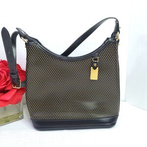 FLAW Dooney  And Bourke Black Perforated Leather Cabriolet Hobo Shoulder Handbag